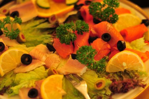 a plate of food with different types of vegetables at Hotel Allegro in Cologne