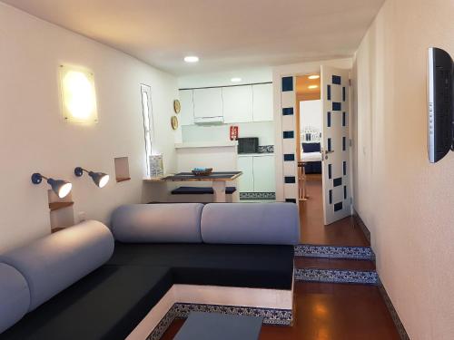 Istumisnurk majutusasutuses Apartamentos Turisticos Soldoiro