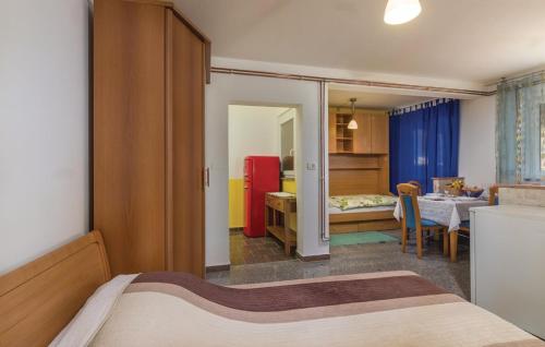 Un ou plusieurs lits dans un hébergement de l'établissement Apartments Residence By