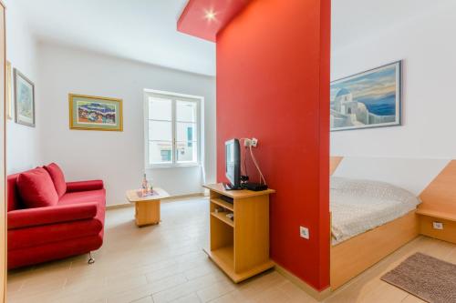 TV a/nebo společenská místnost v ubytování Apartment Ruby
