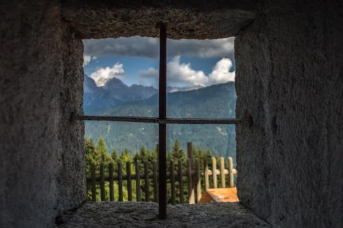 a window with a view of a mountain view at Baita Martin da Fist in Caderzone
