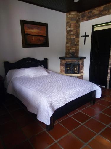 Voodi või voodid majutusasutuse Posadas San Antonio Campestre toas