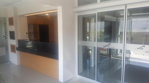 a sliding glass door in a building at A Plus in Edirne