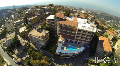 an overhead view of a building with a swimming pool at Le Crillon in Broummana