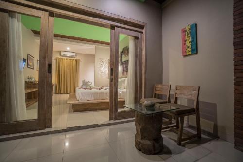 Katil atau katil-katil dalam bilik di Tetirah Boutique Hotel