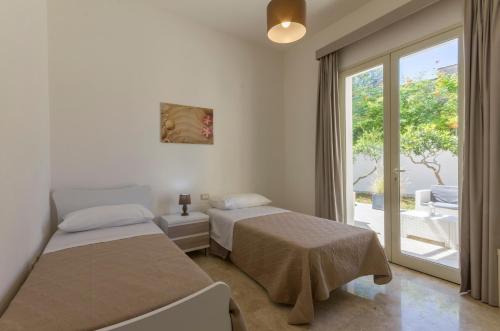 A bed or beds in a room at La Rosa Dei Venti