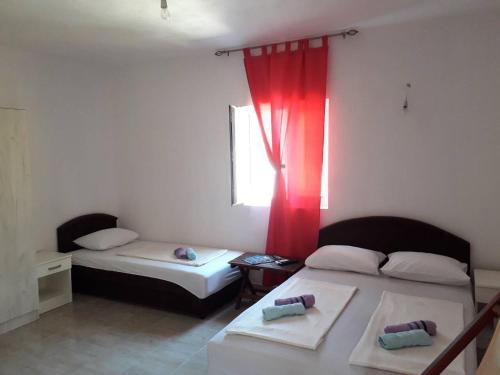 Postel nebo postele na pokoji v ubytování Apartmani Andrea-jaz