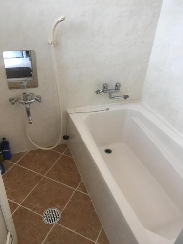 Ένα μπάνιο στο Guesthouse TT Koza