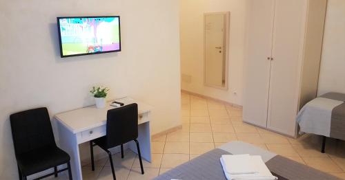 Un televizor și/sau centru de divertisment la Dodo Holiday in Rome