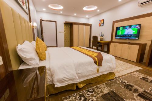 Katil atau katil-katil dalam bilik di Luxury hotel apartments
