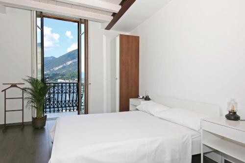 Postel nebo postele na pokoji v ubytování palazzo barindelli suite verde