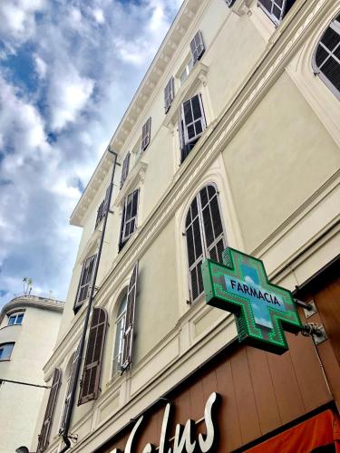 a sign on the side of a building at Maison Beaux-Arts in Sanremo
