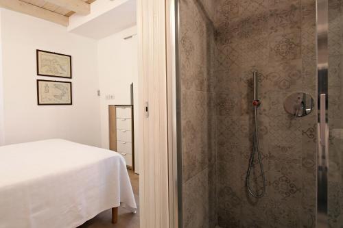 Ένα μπάνιο στο palazzo barindelli suite bianca