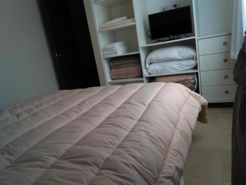 Katil atau katil-katil dalam bilik di Apartamentos Valeria