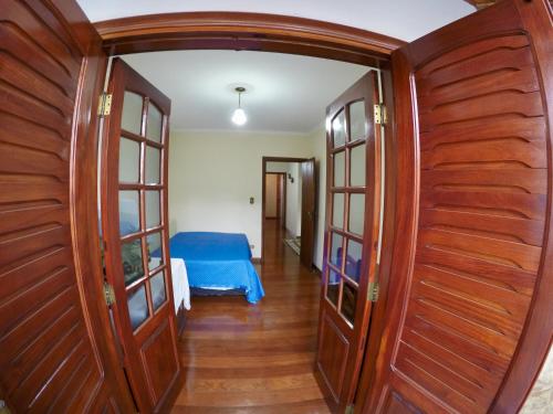 Galería fotográfica de Confortável casa de madeira en Poços de Caldas