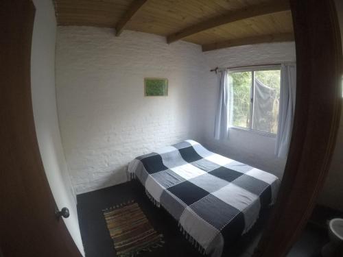 Postel nebo postele na pokoji v ubytování Morro del Tesoro II