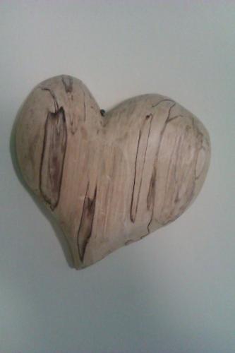 a vase shaped like a heart hanging from a ceiling at Gästehaus die geislerin in Gerlos