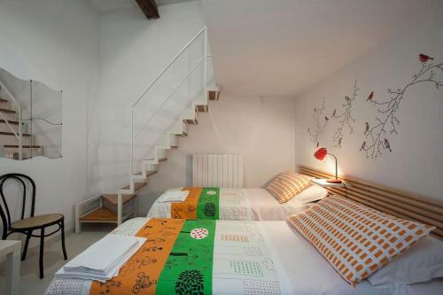 Postel nebo postele na pokoji v ubytování Guesthouse Da Giosuè