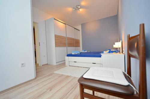 Posteľ alebo postele v izbe v ubytovaní Apartment Pan