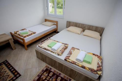 Ένα ή περισσότερα κρεβάτια σε δωμάτιο στο Apartments River Una 5