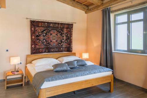Un pat sau paturi într-o cameră la Il Sogno Juniorsuiten - Appart.