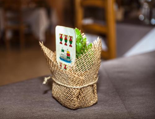 a small toy crown sitting on top of a table at Venere B&B Castelmola in Castelmola