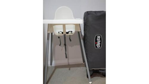 a white table with a black bag next to it at FortyTwo - Oceanside Retreat Busselton in Busselton