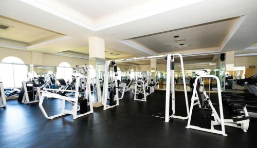 a gym with a lot of tread machines at Suites at Pueblo Bonito Rose' and Spa Cabo San Lucas in Cabo San Lucas