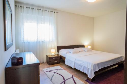 Ein Bett oder Betten in einem Zimmer der Unterkunft Holiday House Petra - Imotski - Makarska
