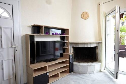TV a/nebo společenská místnost v ubytování Sea Side Villa