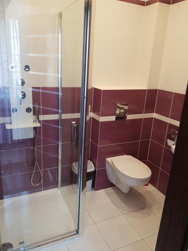 Ένα μπάνιο στο Apartamenty Białowieża