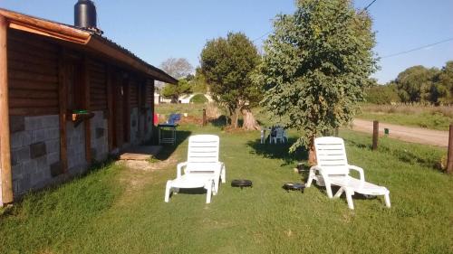 Κήπος έξω από το hermosa cabaña cerca del puerto