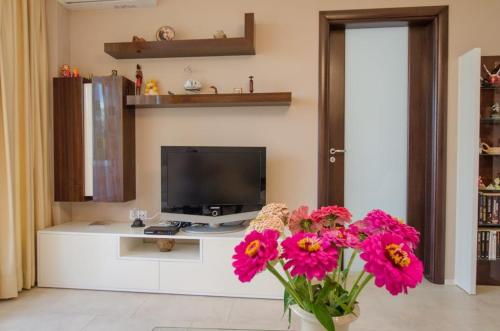 Televisyen dan/atau pusat hiburan di Apartment "Bella"