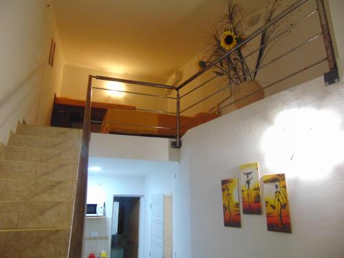 a room with a bunk bed on the wall at Departamentos Anahí in Río Colorado