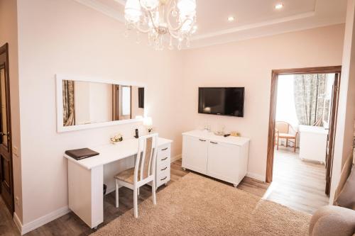 TV a/nebo společenská místnost v ubytování Hotel Ankor