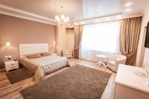 Postel nebo postele na pokoji v ubytování Hotel Ankor