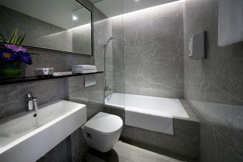 Ванна кімната в Hotel Classic by Venue