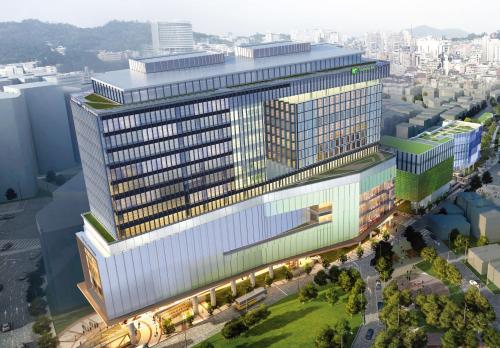 - une vue sur un grand bâtiment avec des lumières dans l'établissement Holiday Inn Express Seoul Hongdae, an IHG Hotel, à Séoul