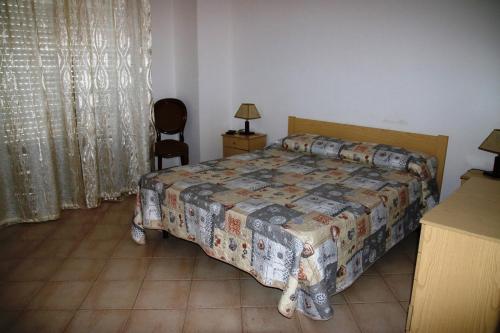 A bed or beds in a room at Edificio Cannizzo