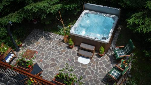 an overhead view of a hot tub in a backyard at Chalet Calla in Mrkopalj