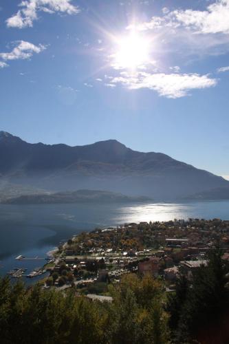 a view of a city and a body of water at Residence Le Azalee & SPA in Vercana