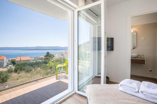 Ένα ή περισσότερα κρεβάτια σε δωμάτιο στο Villa Blanka for 12