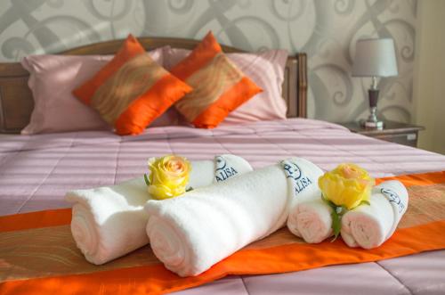 Ένα ή περισσότερα κρεβάτια σε δωμάτιο στο Alisa Krabi Hotel-SHA Plus