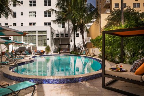 a swimming pool in the middle of a hotel at Generator Miami in Miami Beach