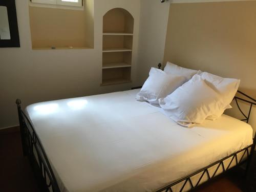 Posteľ alebo postele v izbe v ubytovaní Appartement Place des lices Saint Tropez