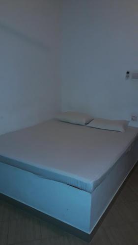 Katil atau katil-katil dalam bilik di Anicia Beach House