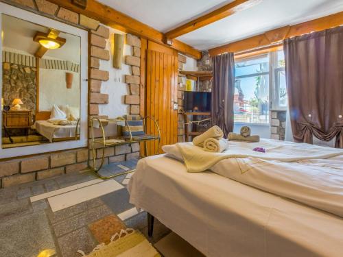 En eller flere senge i et værelse på Apartments Susanne