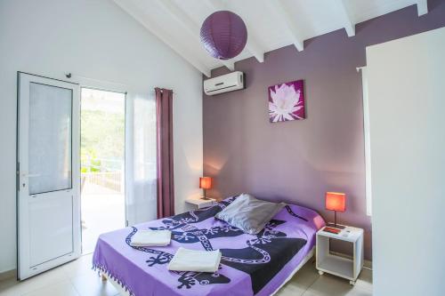מיטה או מיטות בחדר ב-Villa Bel Plaisi
