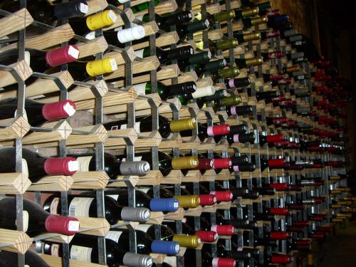 a wall of wine bottles in a wine cellar at Annandale Arms Hotel in Moffat