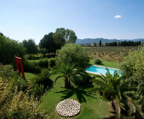 A view of the pool at Agriturismo Podere il Leccio or nearby